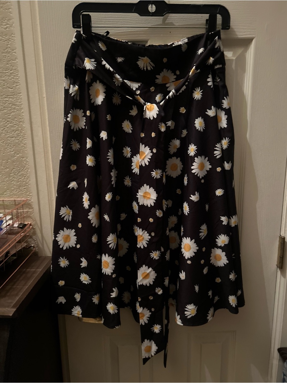 Belle Pague navi circular maxi skirt with white flowers, size Large.